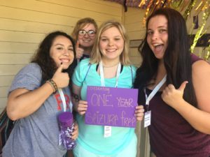 Group of girls at summer camp celebrating one year of being seizure free.