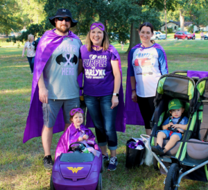 Superhero family at the Walk to END EPILEPSY. They walk to support research for their young daughter with epilepsy.